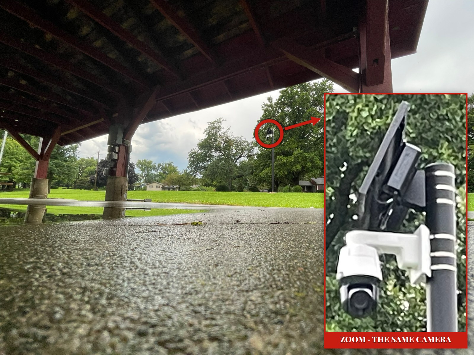 The camera along North River Drive in Marion, circled, photographed by OurWeek from under the roof of the public picnic shelter on August 11, 2026. The lens is visible from inside the shelter: the camera points into it. Inset: the same camera, zoomed.